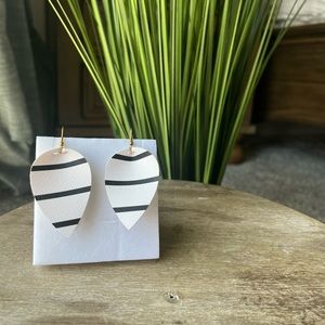 Faux leather earrings. Never worn. Purchased from local vendor.